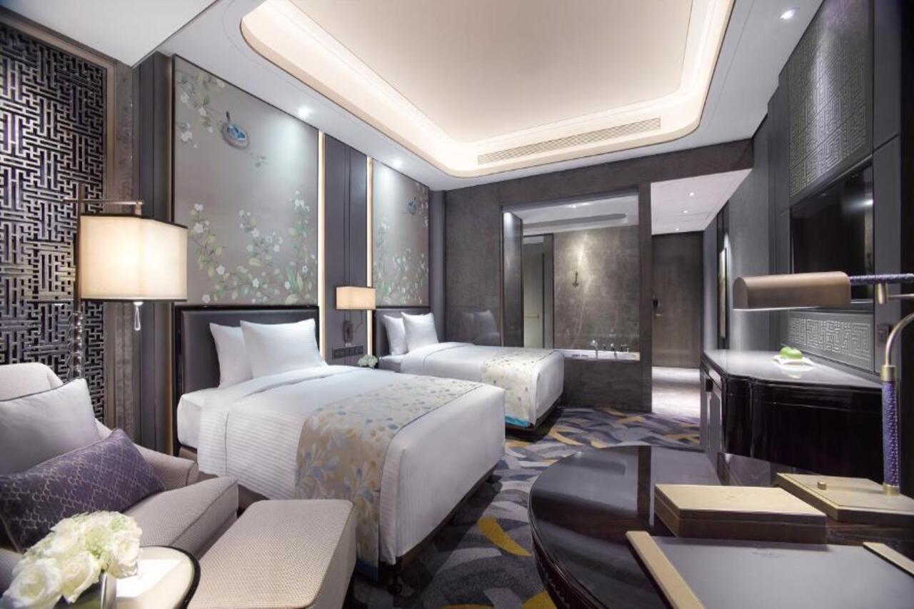 Wanda Vista Zhengzhou Hotel Exterior photo