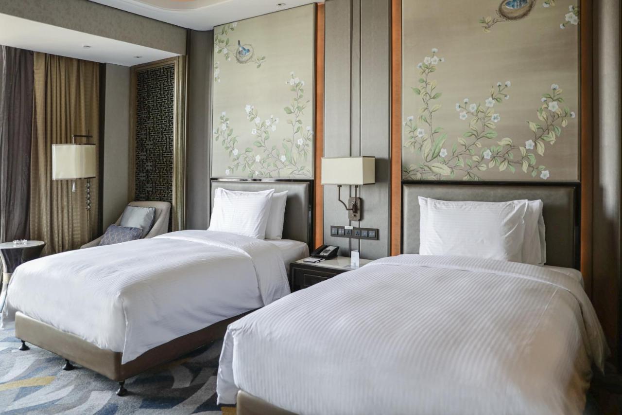 Wanda Vista Zhengzhou Hotel Exterior photo
