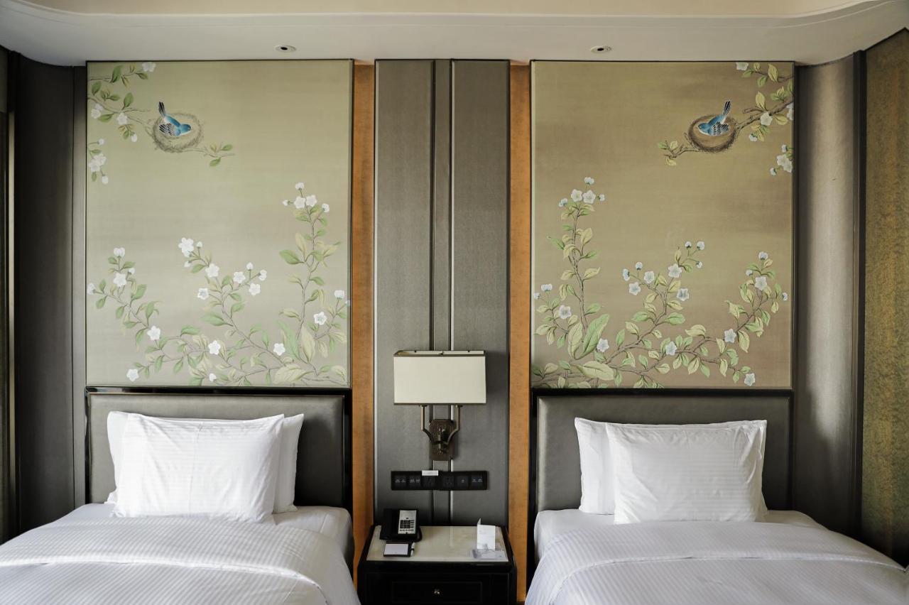 Wanda Vista Zhengzhou Hotel Exterior photo